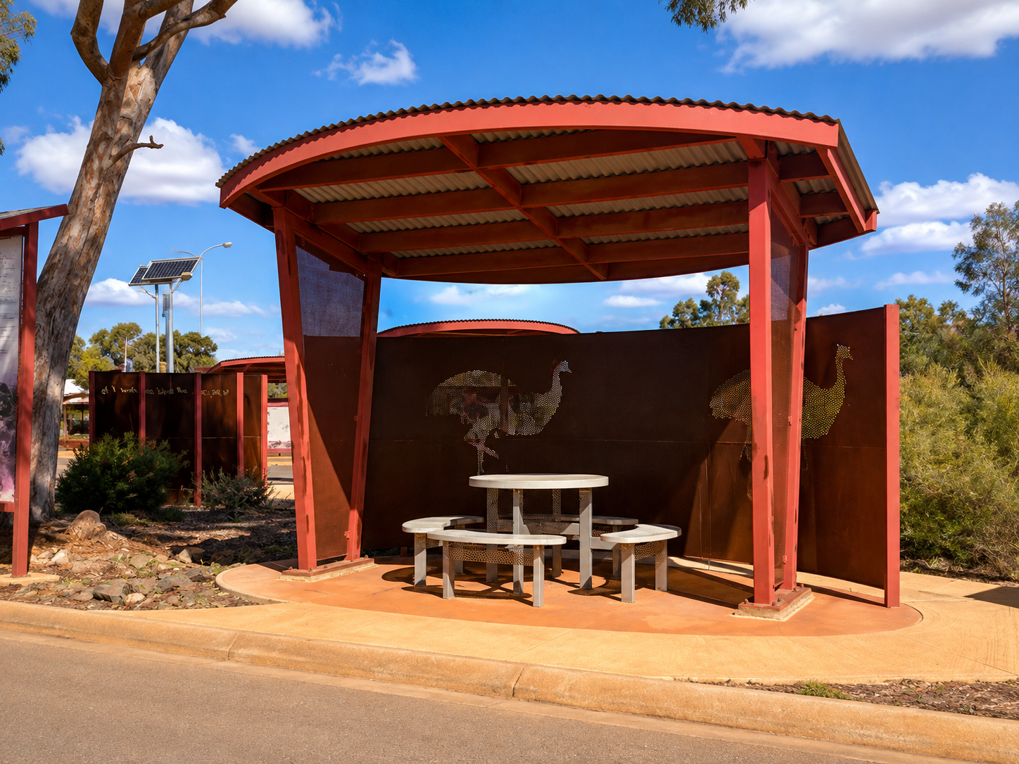Sheltered picnic seating at the Oasis Rest Area in Cue