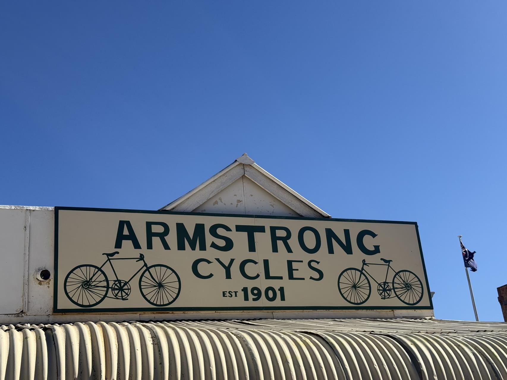 Armstrong Cycles heritage sign in Austin Street Cue
