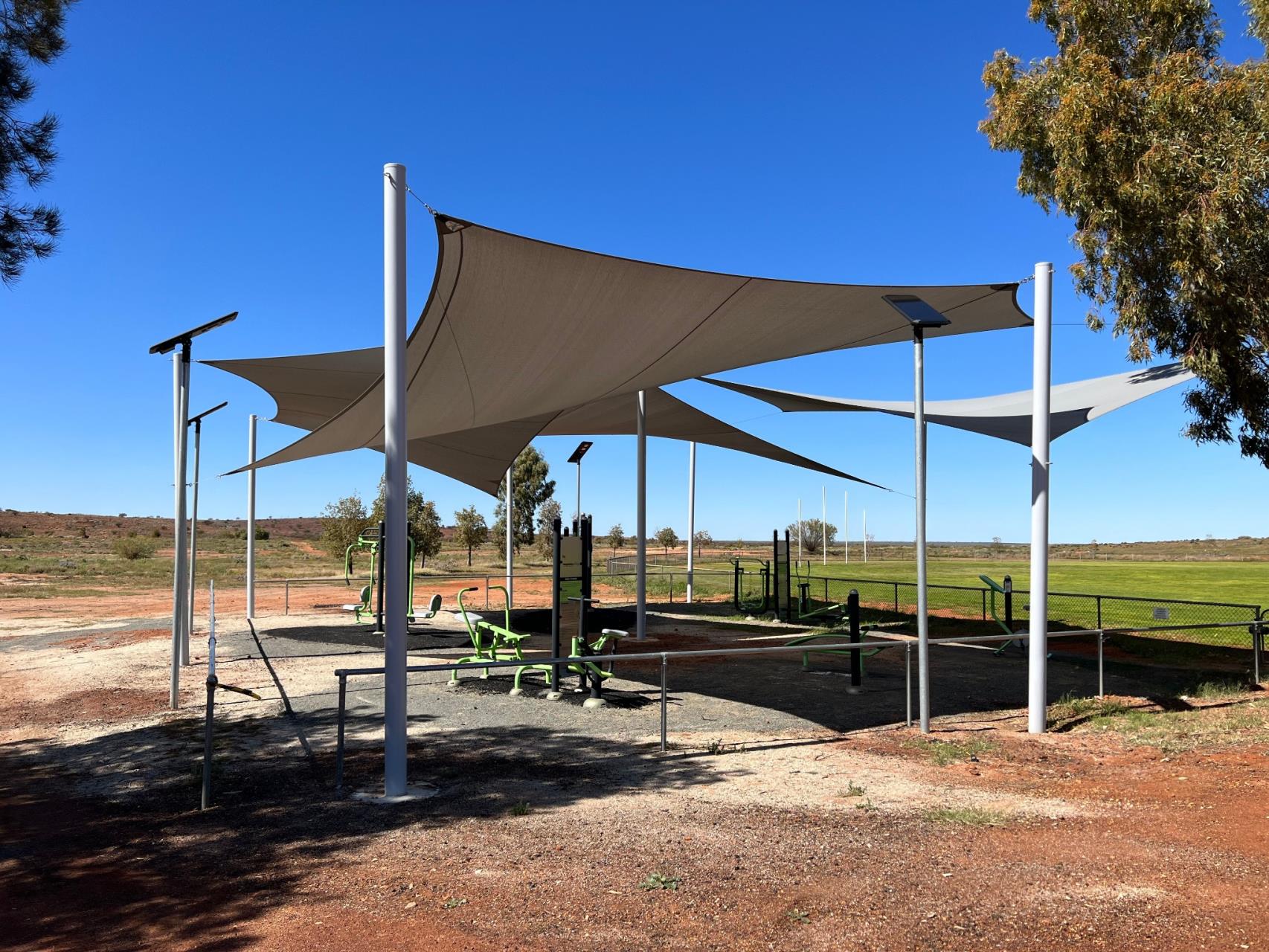 Shaded outdoor gym beside the Cue Sports Oval