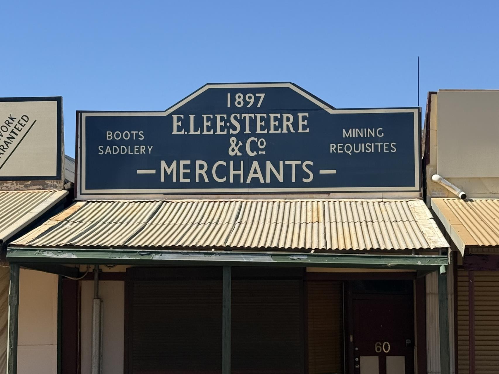 E Lee Steere and Co Merchants heritage sign in Austin Street Cue