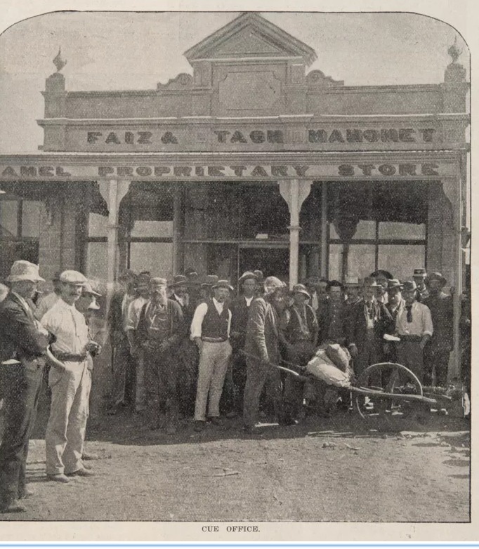 Historic photograph of the Faiz and Tagh Mahomet Camel Proprietary Store, captioned Cue Office