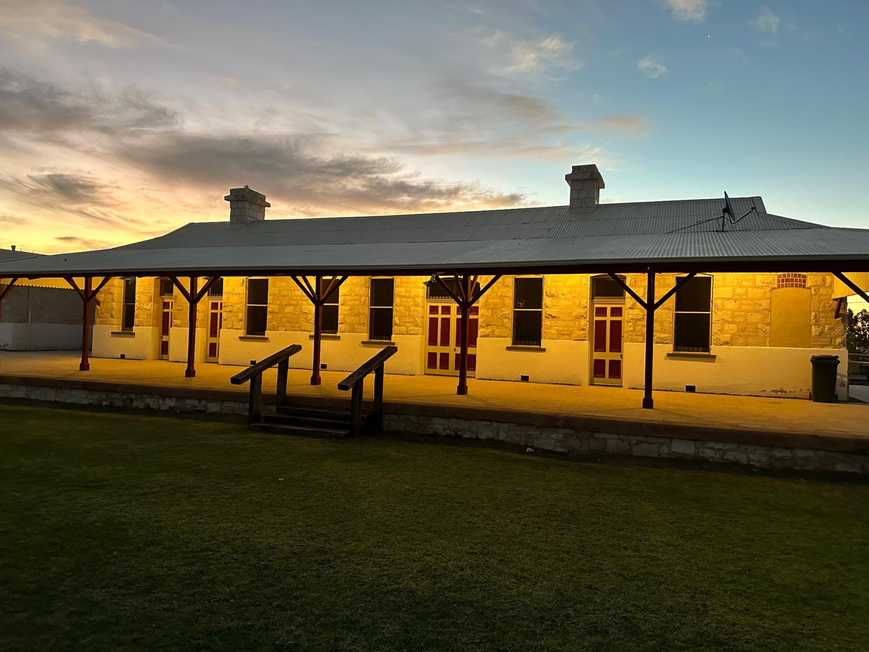 Cue Railway Station illuminated at dusk